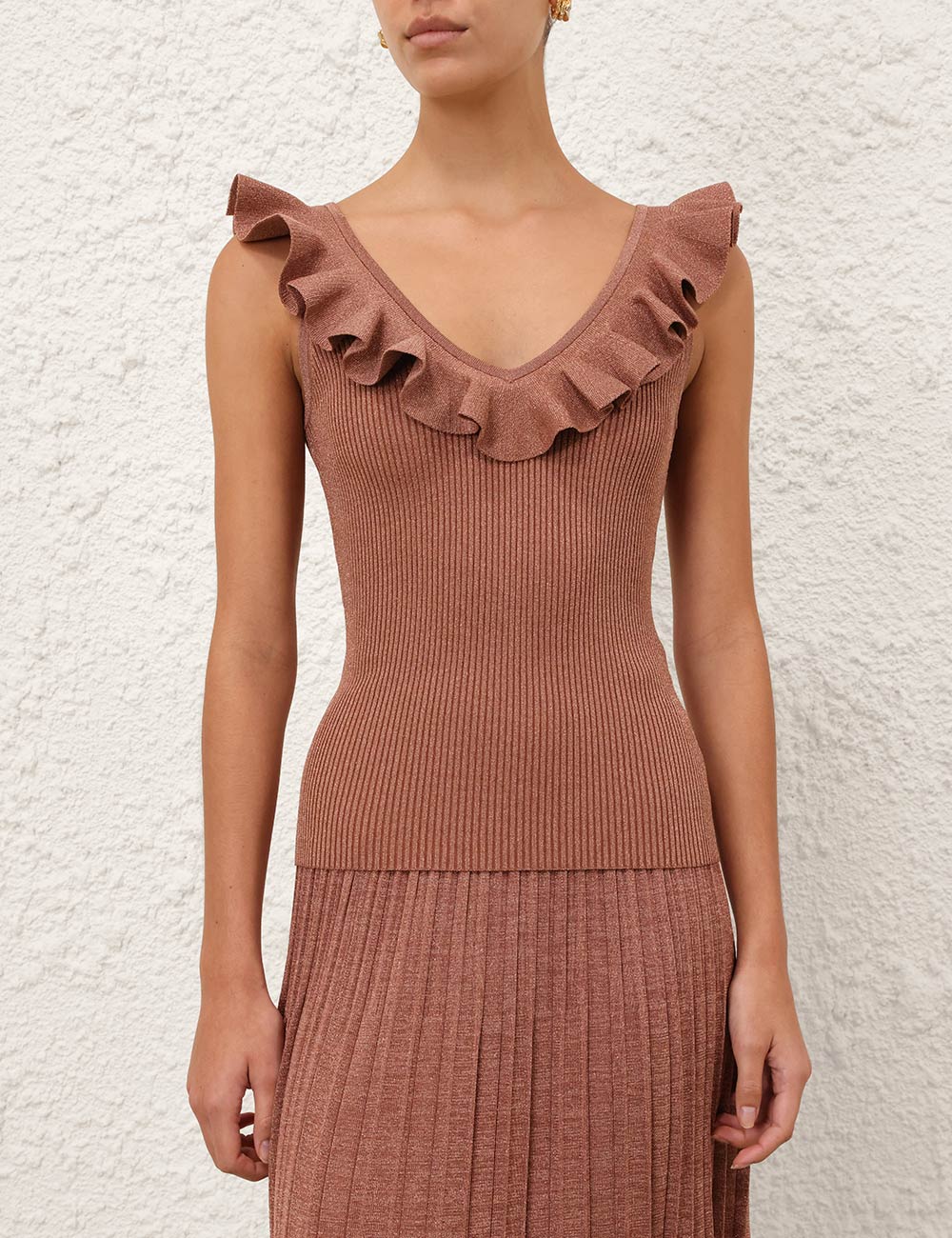 Top con volantes metálico Wanderlust